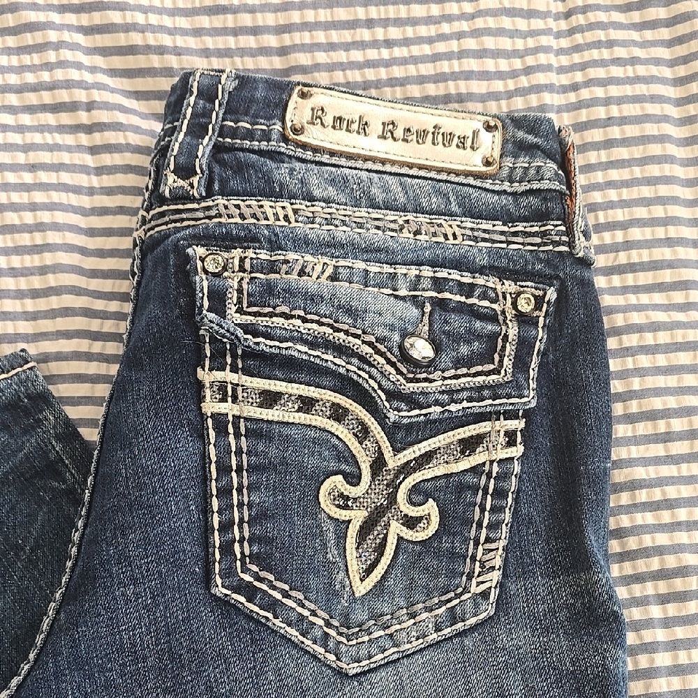 Rock Revival Blue Jeans with Distinctive Stitching